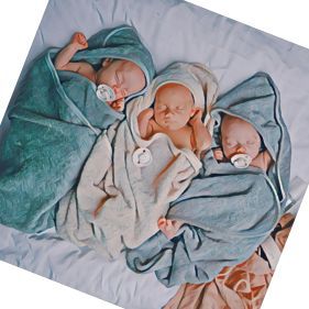 Warm & Cozy Babies with the Mushie Hooded Towel